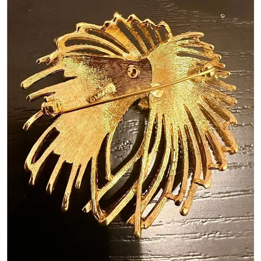 Vintage Signed Monet Gold Tone Textured Swirl Brooch